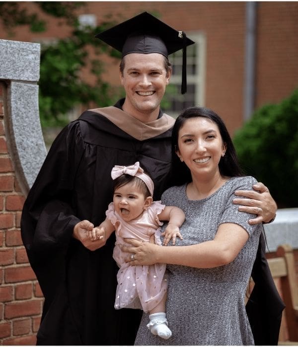 Max Fox, his wife, and baby at Wake Forest graduation.